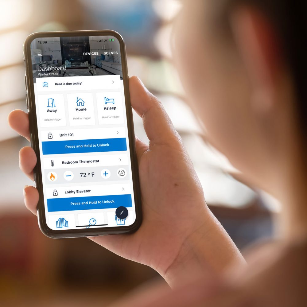 Woman using STRATIS smart technology on her phone